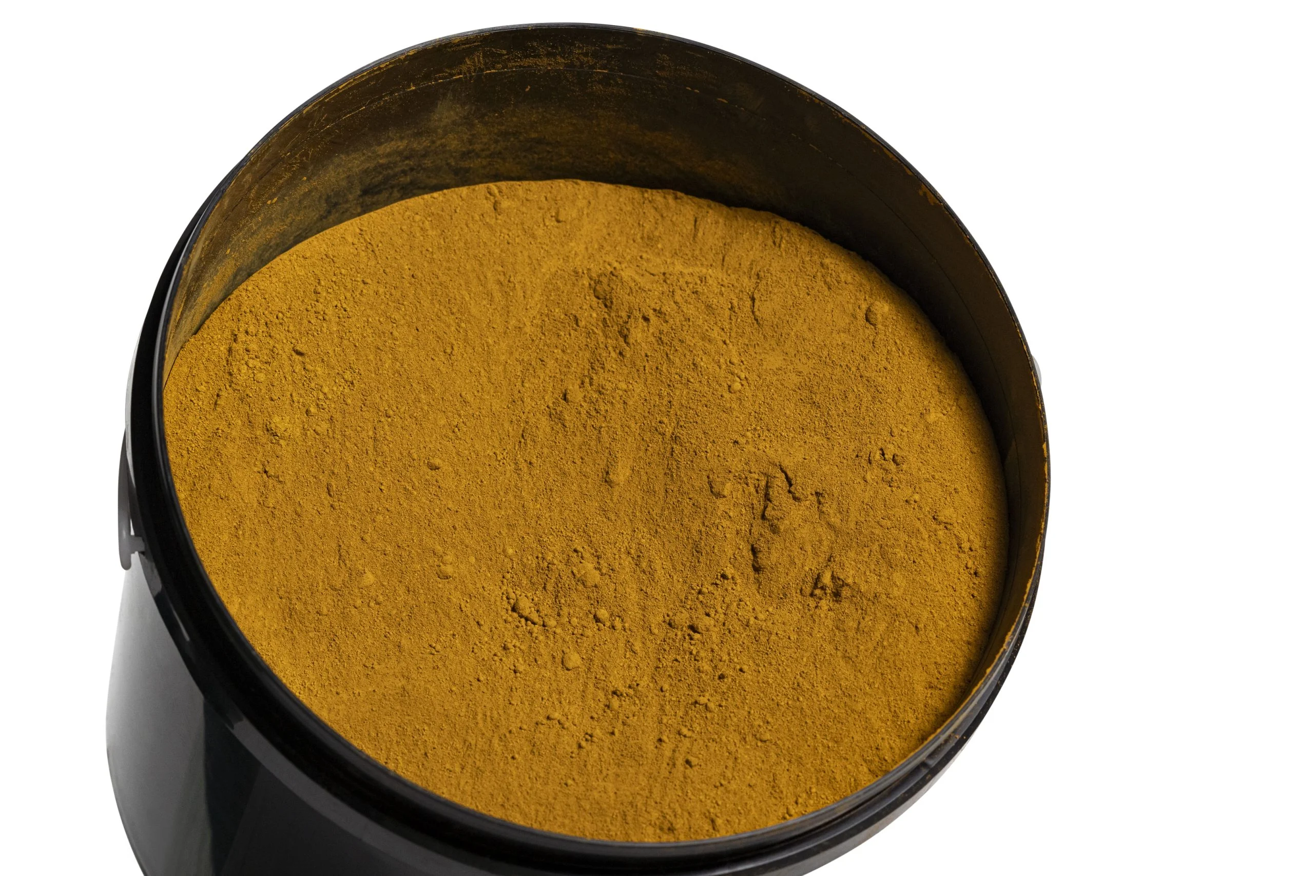Container filled with turmeric powder
