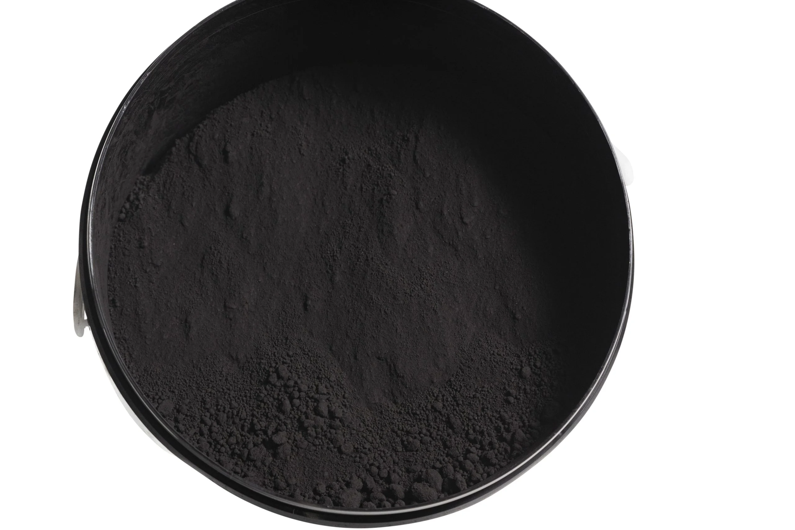 Container filled with black powder pigment.