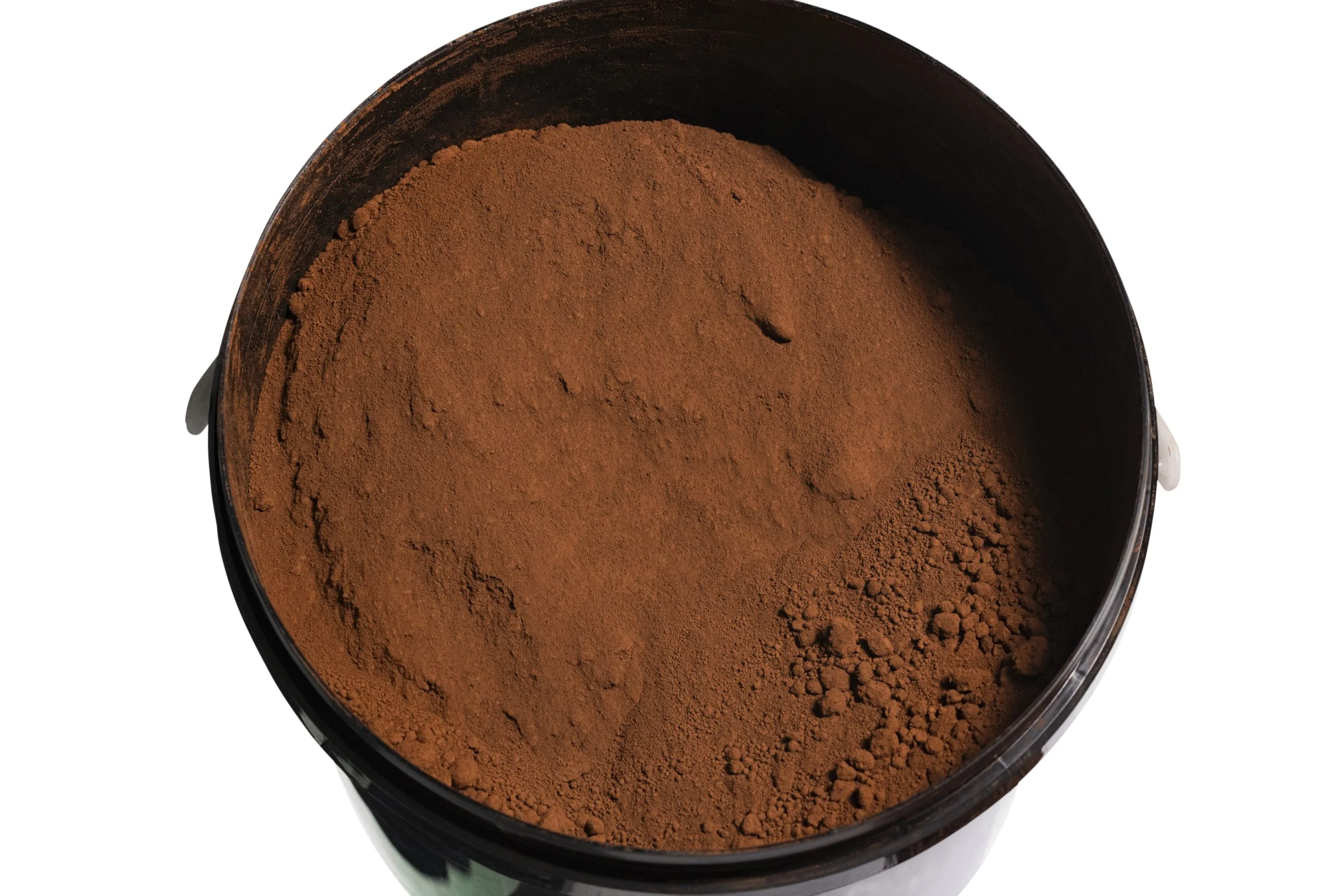 Bucket filled with cocoa powder.