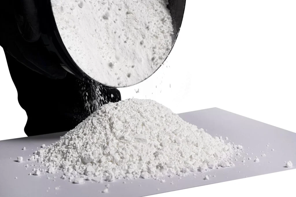 Pouring white powder onto a surface