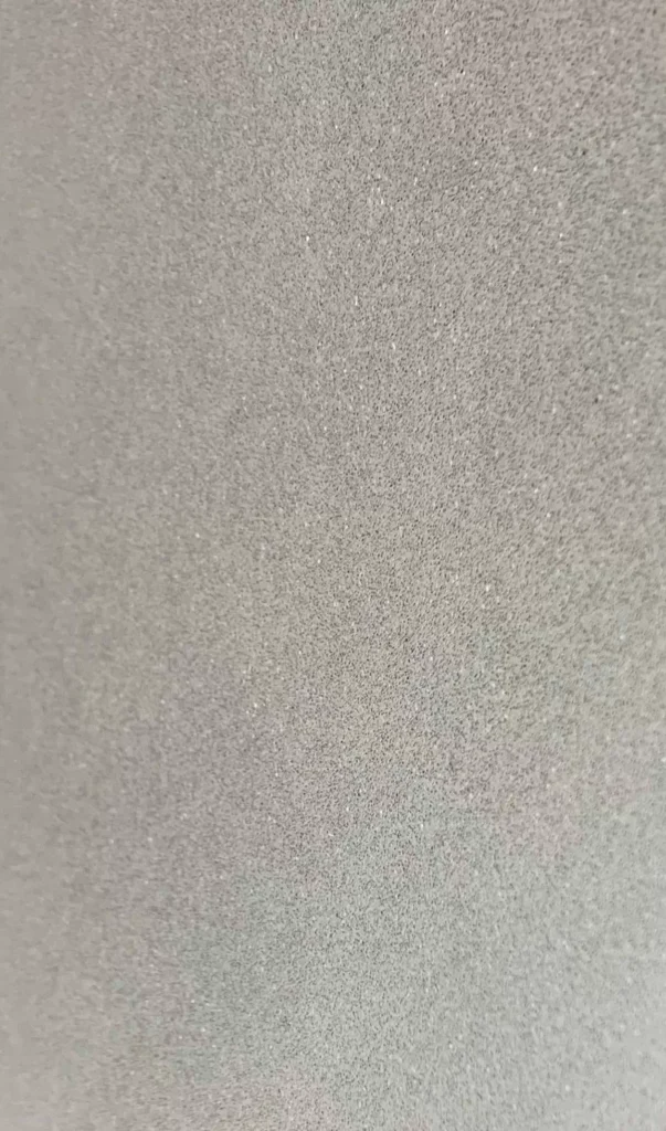 Close-up of grey sand texture.