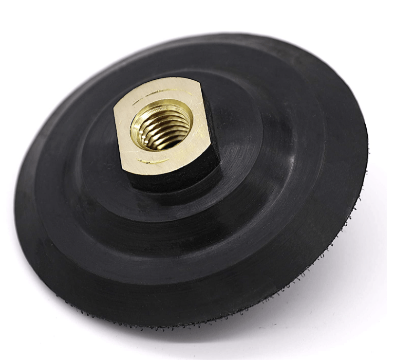 Black rubber polishing pad with brass insert