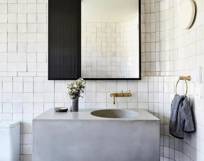 Modern minimalist bathroom with square tiles.