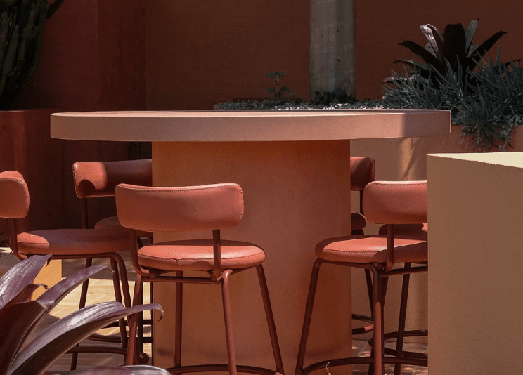 Outdoor setting with pink table and chairs