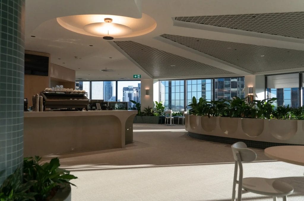 Modern office space with plants and natural light.