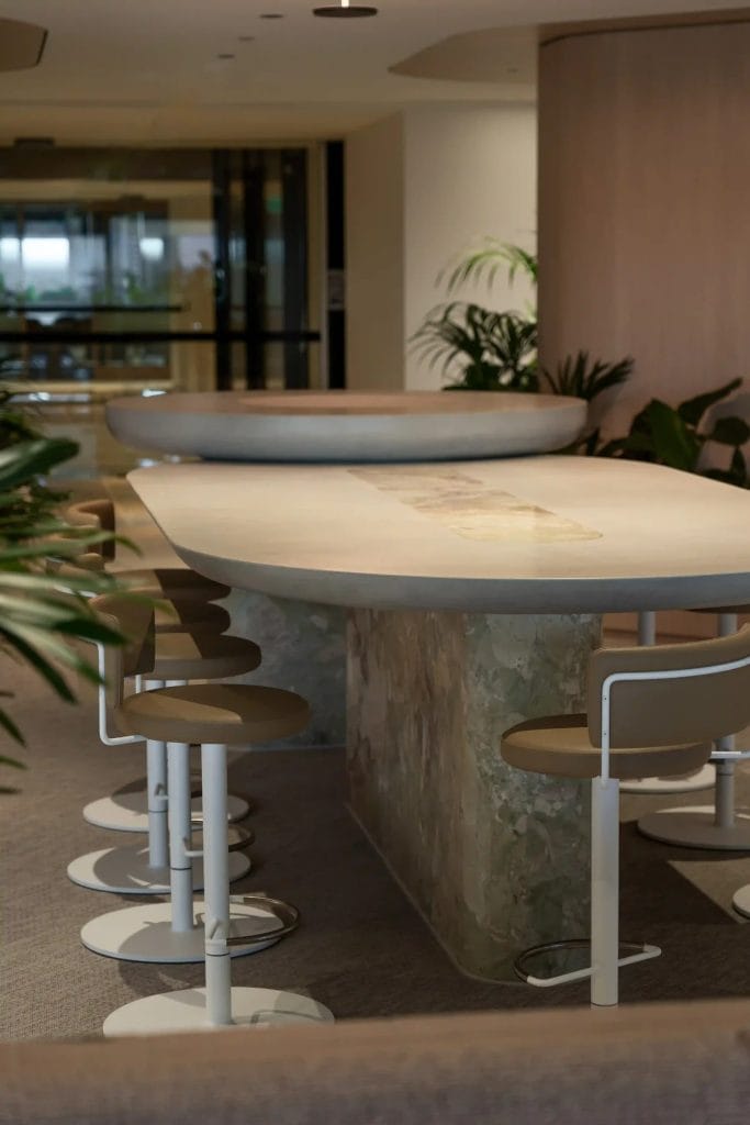 Modern office interior with stools and plants